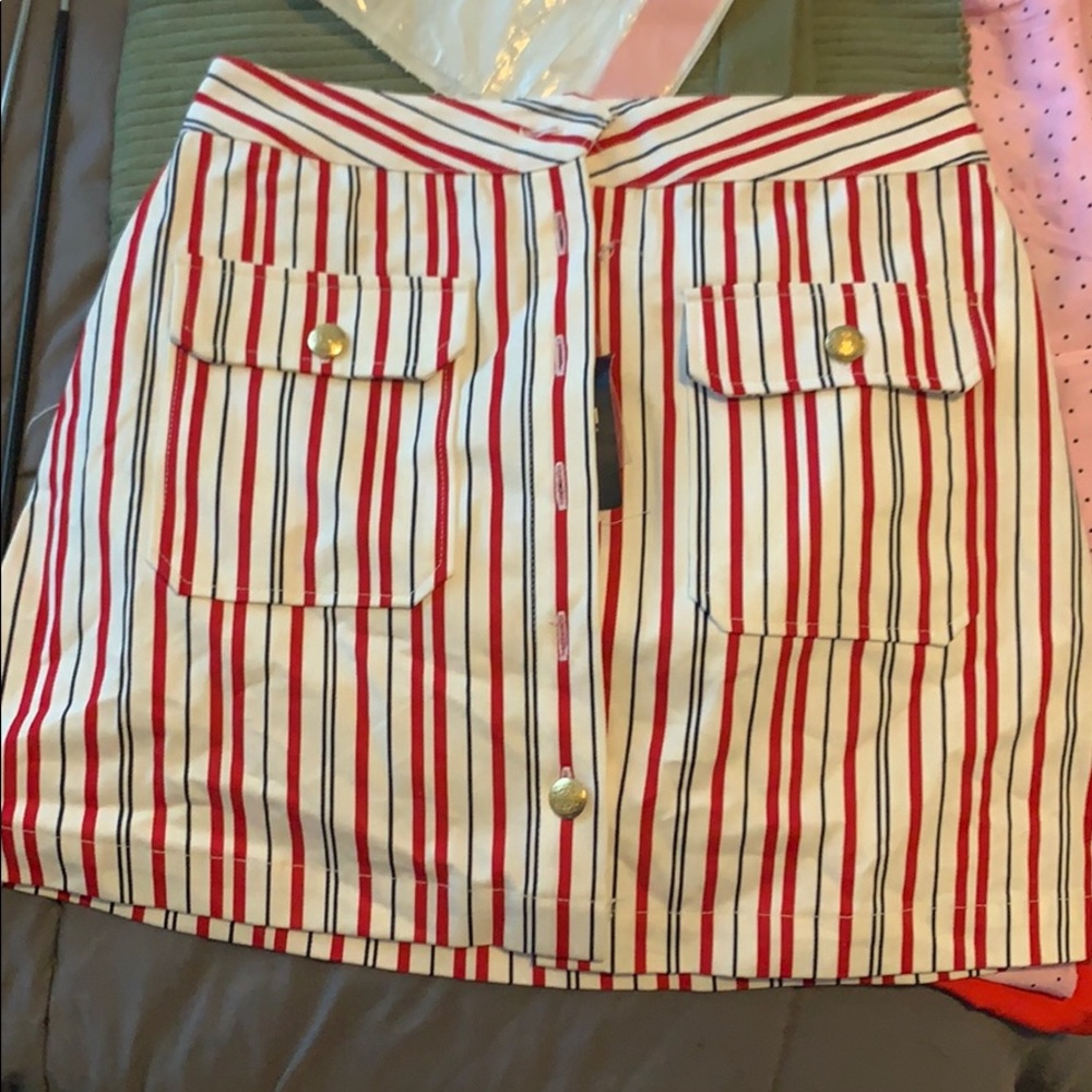 red white and black button skirt